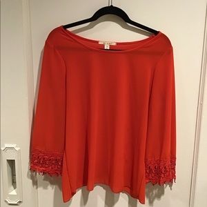 Red top with criss-cross back